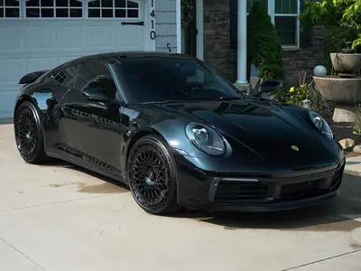 Black Porsche Ceramic Coating in Driveway thumbnail