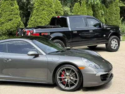 Service Truck Behind Porsche thumbnail