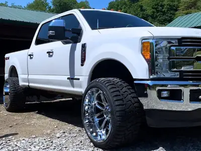 White Lifted Truck thumbnail