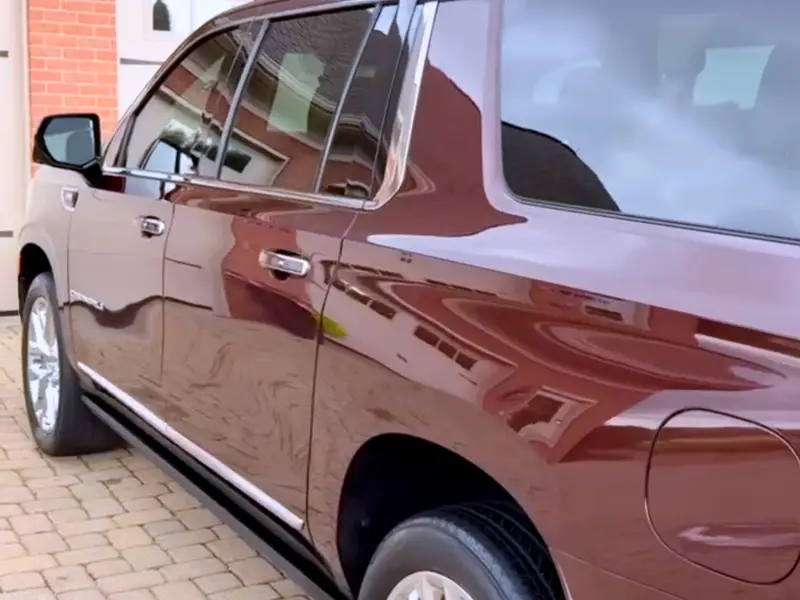 SUV exterior detail result showing a clean, glossy finish and proper paint care