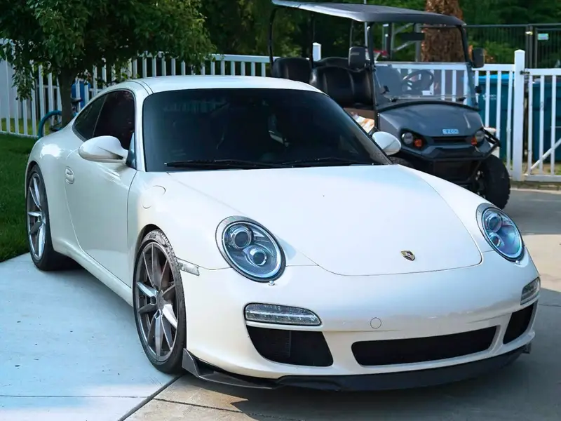 White Porsche exterior front view after professional mobile detailing service
